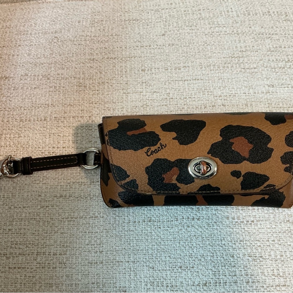 Coach Leopard Print Turnlock Wristlet in Brown and Black